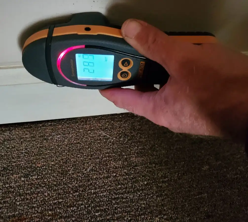 Moisture detection at baseboard during Sewage Cleanup & Sanitation in Wharton